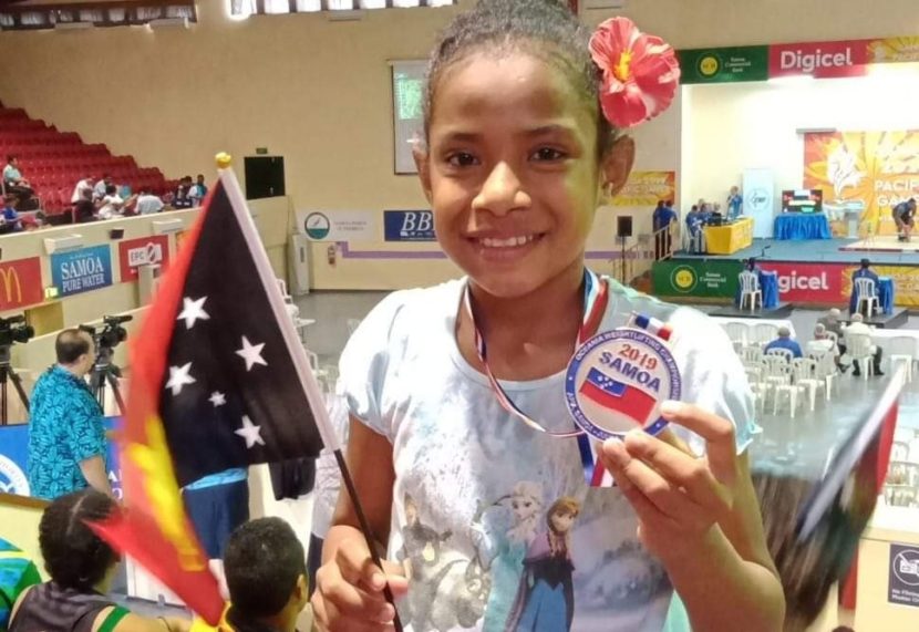 skerah's tweet photo. You'd be mistaken to think that this young girl is showing off a medal won by an elder sibling in Samoa. This is 14 year old lifter Idau Vagi - the next crop of talent released from the gym that's under the mango tree. Read her story https://t.co/c4g0fXoHfB https://t.co/uN8zd3W513