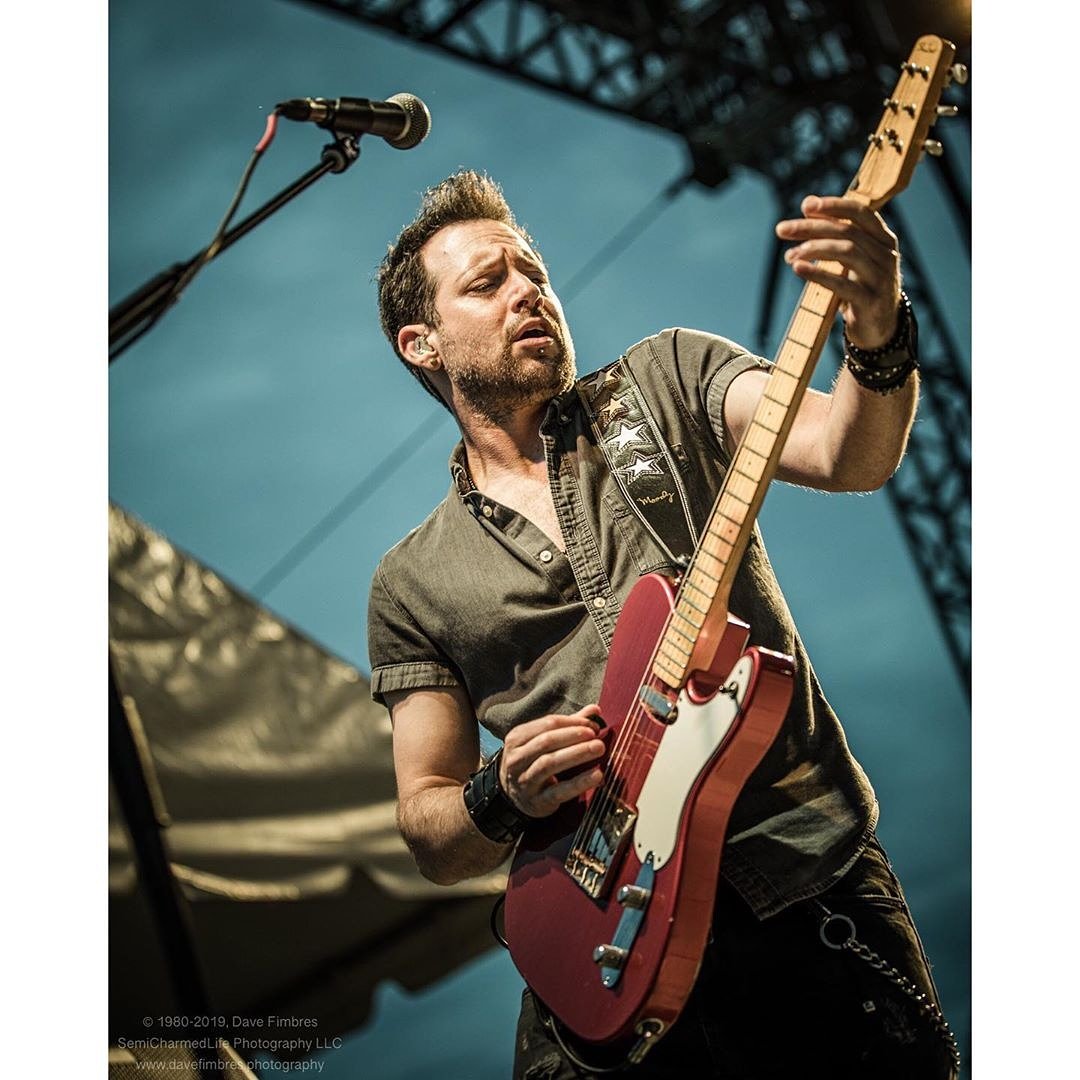 SeanHmusic's tweet photo. Awesome shot by @semicharmedlifephotography a few weeks back at @celebratefairfax with @smashmouthsmash π€πΌπ€πΌ
Thank Dave ππΌππΌπ
.
.
#shabatguitars #moodyleather #labellastrings #Uepero #dallenpickups #g7thcapos https://t.co/lUUJ6Mlgap