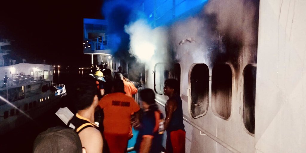 dyar765's tweet photo. Fire incident On Board MV Trans Asia 1 at FF CRuz Wharf, Mandaue City. About  7:18am, responding BFP Team declared fire out. Composite team of PCG, BFP &amp; Ship crew is now clearing the affected area. Photo credit PCG CV via @JimreyBiosa @DZAR1026 @smninewschannel https://t.co/kWU6uarH1K