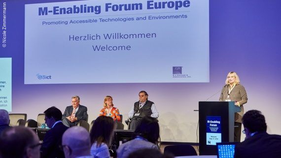 Photo of panelists on stage at the first m-enabling Europe Forum