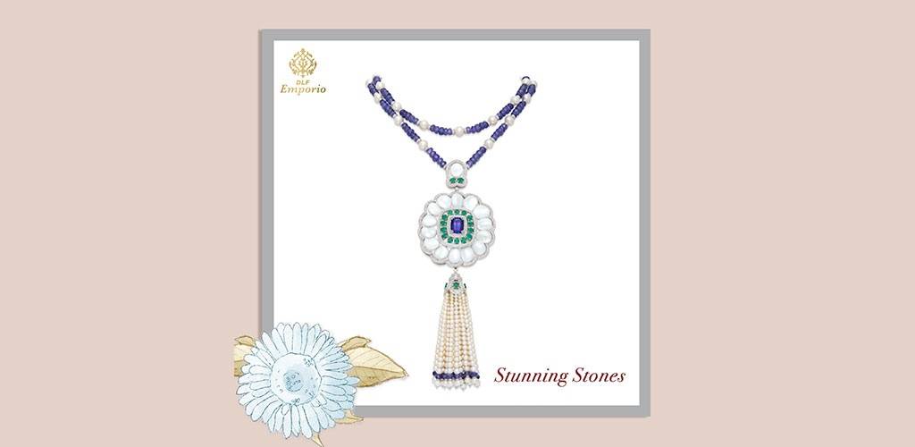This exquisitely #handcrafted tanzanite, mother of #pearl and #emerald #floral sautoir from Rose’s Colours Of Life Collection is #designed to #perfection. #Explore this collection at DLF Emporio.
