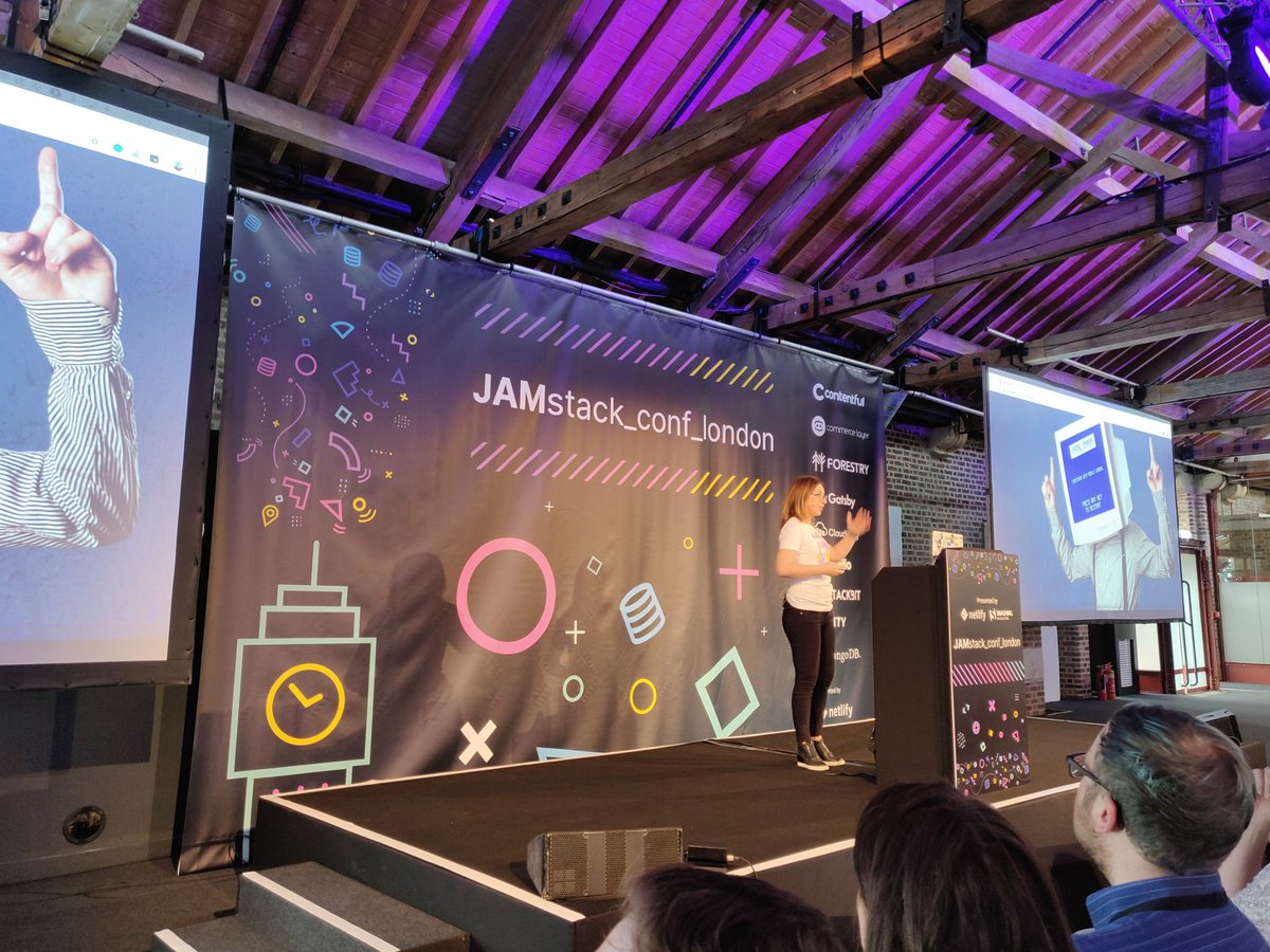 alexnmoldovan's tweet photo. We're (almost) front row friends for @simona_cotin and she's just killing it at #JAMstackLondon #Serverless https://t.co/bR301QzM3g