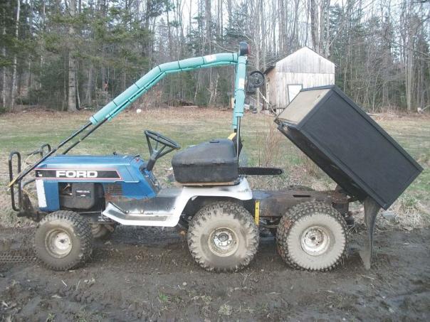 FarmShow's tweet image. He converted his 1980’s Ford 16 hp. garden tractor into a 4-WD, tandem axle model equipped with a dump box. He also built a trailer to pull behind it. #dumpbox #gardentractor #trailer #utv #farm farmshow.com/a_article.php?…
