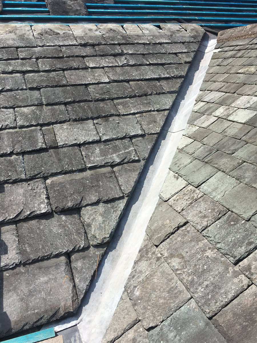 Random Slating. It's like putting a big jigsaw puzzle back together. This is the true art of roofing, skating in a dimensioning random slate roof. #roofing #work #slate #slating #randomslate #tradesman #velux #valley