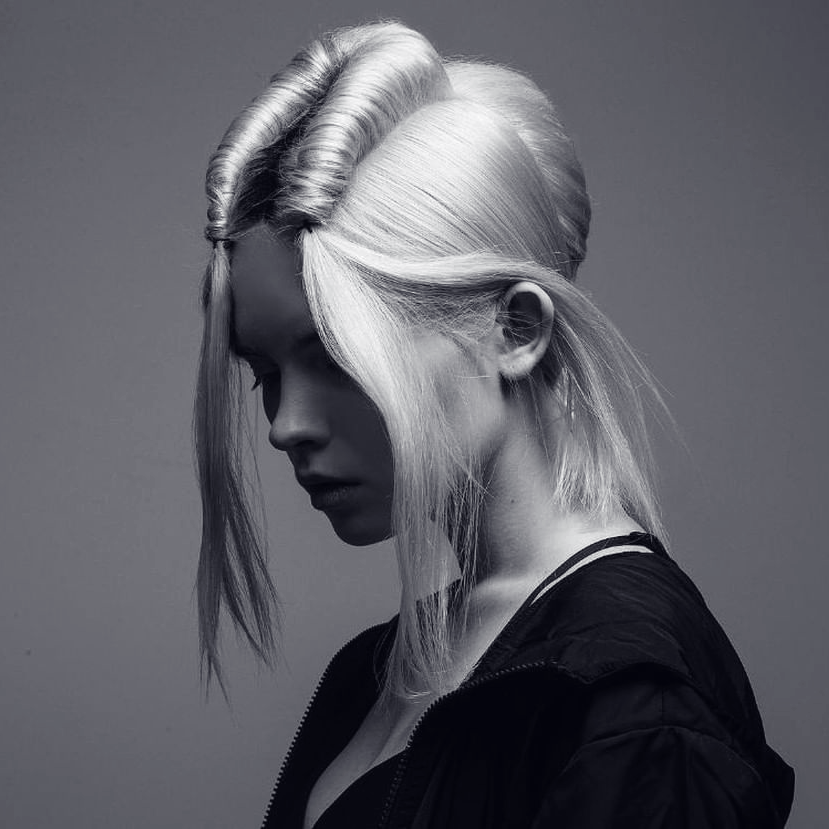 We're all about these sleek twists. ✨ Spray your hair with Shine Shaker for a luminous, mirror-like finish. Click the link to shop all the styling essentials: bit.ly/2VKvECT #IAMWHATSNEXT #ShapeYourWorld