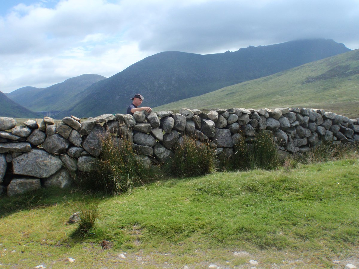 Mournelive's tweet photo. Our countryside team repaired the stone wall around the gate and stile at Banns Road today. https://t.co/ho0oeg4x5B