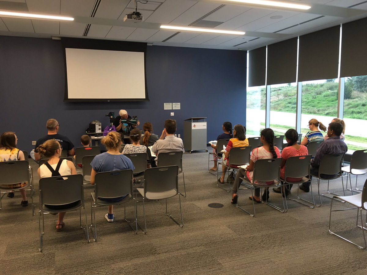 SLASLibrary's tweet photo. Larry Campbell of the St. Louis Astronomical Society shows patrons at @SLCL how to use the @libraryscope https://t.co/7Qlc93fptS