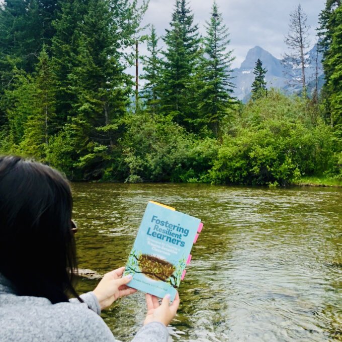 Perfect day for some light reading in the Canadian Rockies! 🇨🇦🏞📖 <a href="/_MsSchwartz/">Cassie Schwartz</a> <a href="/_mrsmaki/">Angela Maki</a> <a href="/mssharp4/">Ms. Sharp</a> I’m getting some great ideas to help us create #traumasensitiveclassrooms at Apollo! #SummerReading #ApolloPride63