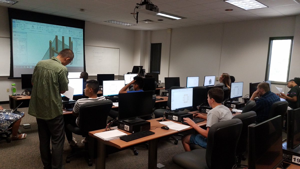 learndeepmke's tweet photo. Day 3 @UWM_Engineering with support from #Building2Learn-- Students from Messmer HS, @CarmenEagles, @BrownDeerSD, @IkeSDNB, & @MilwaukeeMPS Bay View & Obama working on construction drawings for #ZooTrainChallenge water tower for @MKECountyZoo https://t.co/M9s3SHo9vn