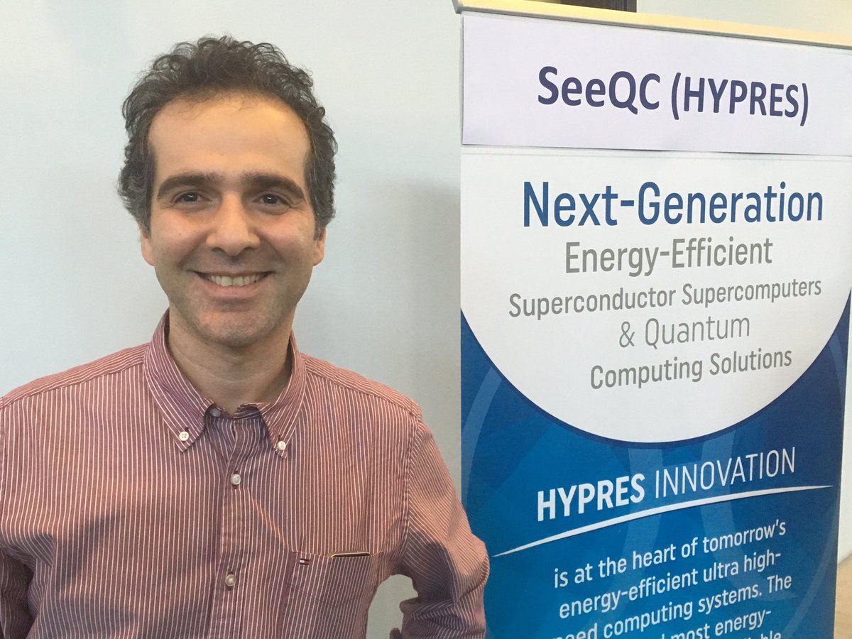 Yale_QI's tweet photo. Amir Jafari Salim talking about their scaleable quantum technology for #seeqc  @NewLab https://t.co/kdCXQrGqyw