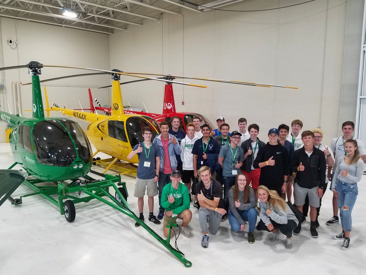UND_Heli's tweet photo. We're halfway through the first @undaerospace International Aerospace Camp of the summer! This year is the first time we are offering introductory flights to campers in the R44's #flyUND #UNDheli #UNDproud @RobisnonHelicopter https://t.co/rxY6PnrcId