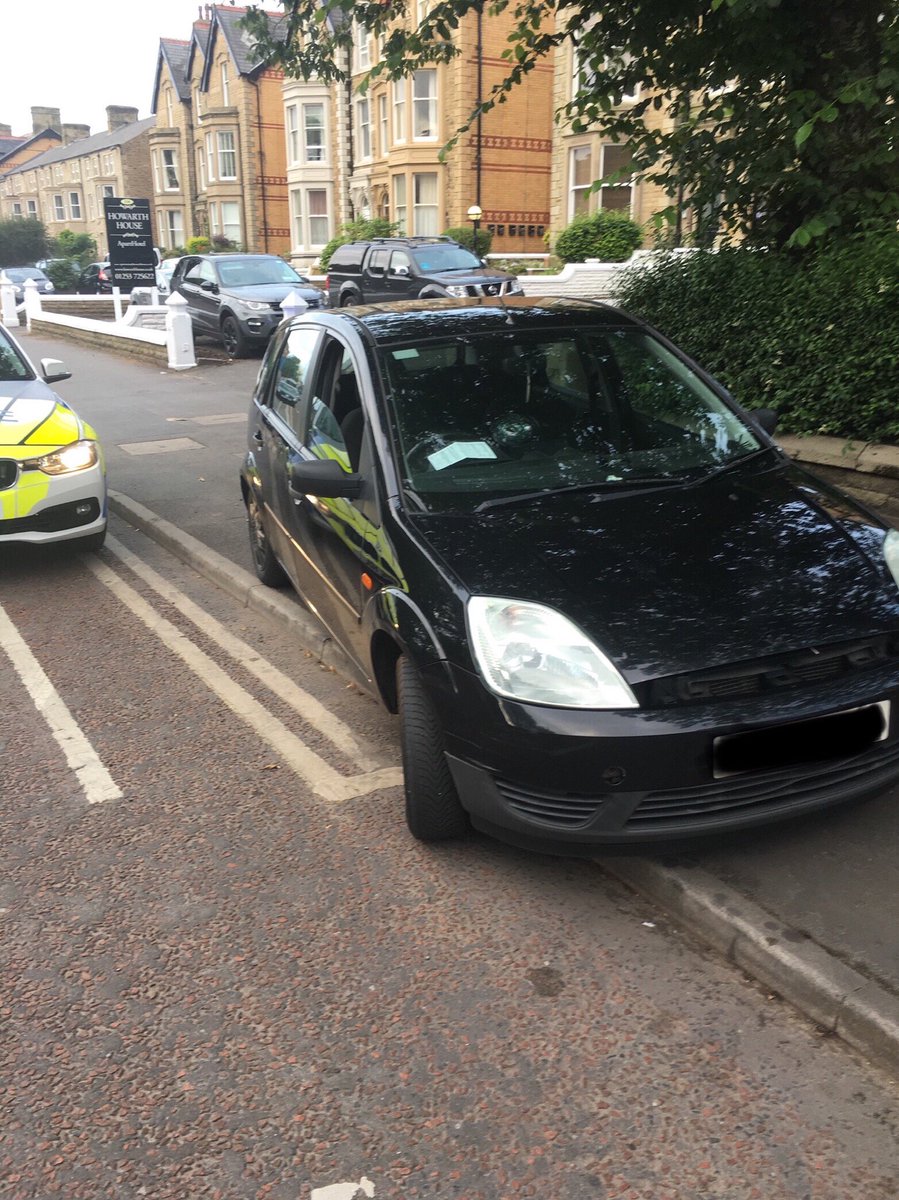 LancsRoadPolice's tweet photo. This car was found in a bad state or repair abandoned in the middle of the road in St Anne’s. Car removed by police. #T2TacOps. #HO58. https://t.co/hoUqF7l3GT