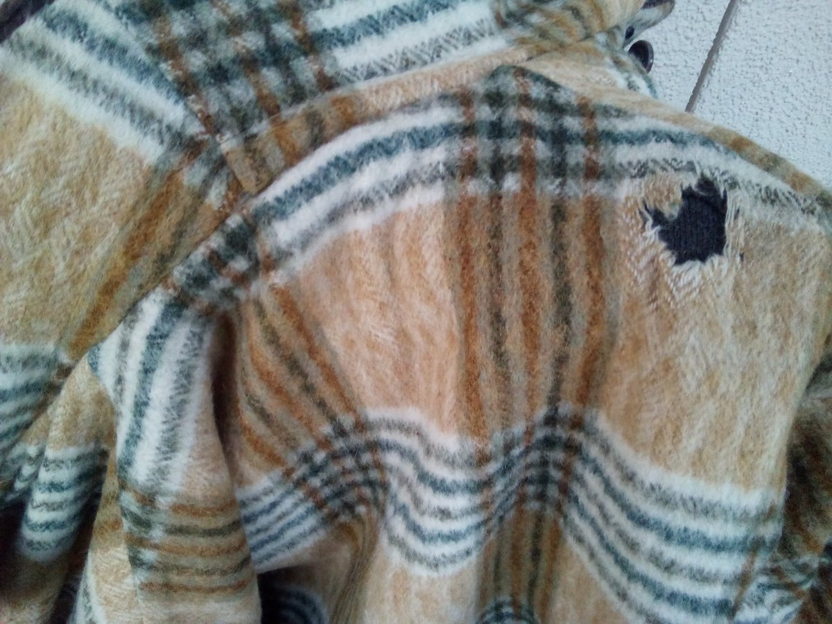 JKolawsky's tweet photo. @realDonaldTrump 
The exterior lining came from my Grandfathers coat that hole was the second bullet put into my Grandfather while I watched from the window of the house 580 feet away. My Grandfather was someone . https://t.co/HRT6K3YCR2
