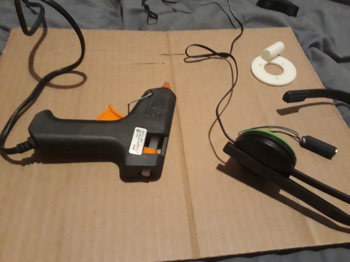 NickAGBruce's tweet photo. @nohandsnoexcuse @brycej When you're happy with a draft model print that you decided to hotglue it to the prototype for tonight's gaming session!
Obviously there's tweaks needed to the model before I can say I'm done with it π #progress #CochlearHeadset https://t.co/v07doRxtFk