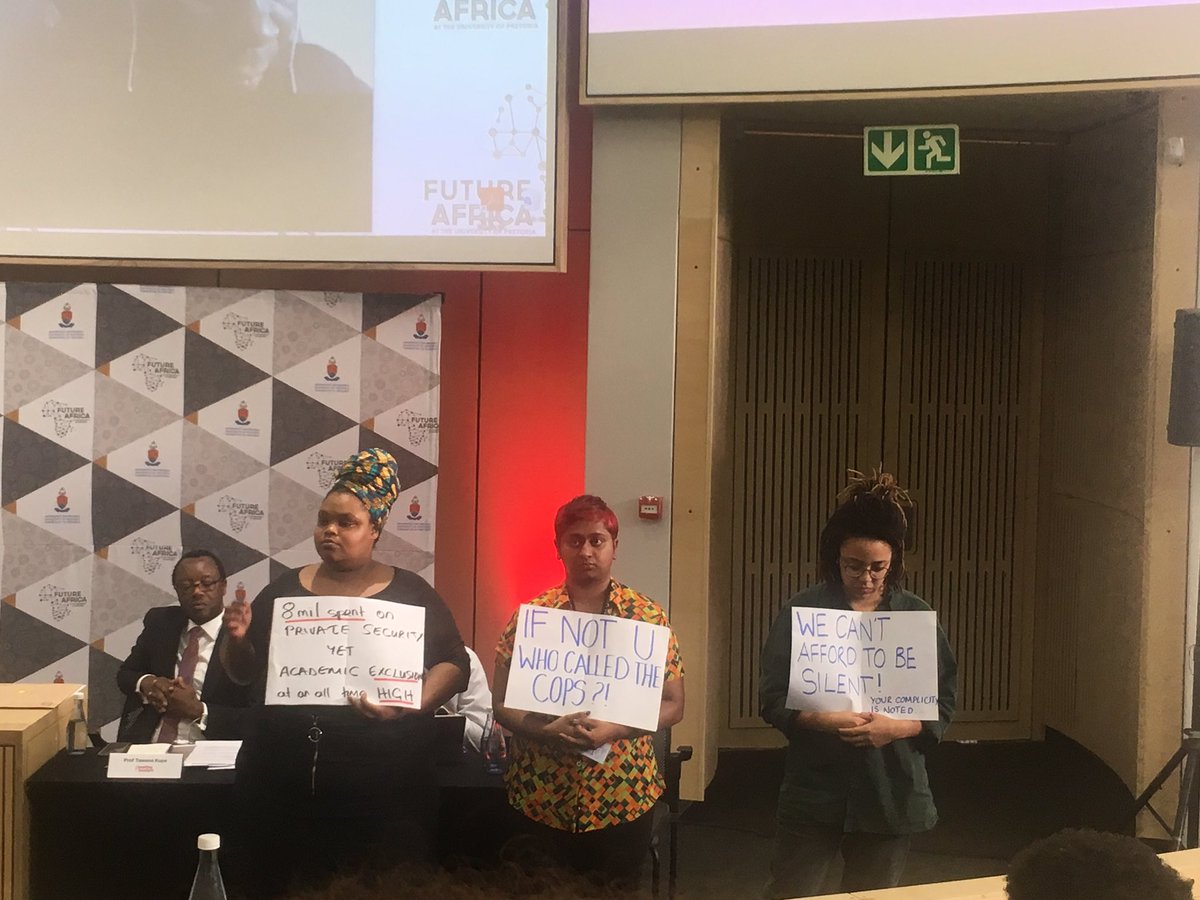 UParadigms's tweet photo. The protestors cover Prof Adam Habib as he speaks. #UnsettlingParadigms #ChangeWeMust #ChangeWeWill https://t.co/UMthMcL5yh