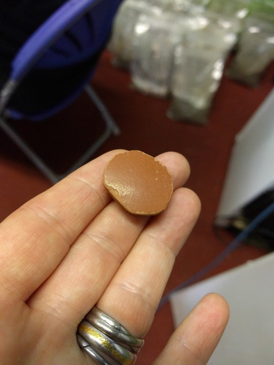 Bremetenacum's tweet photo. We've also had this reappropriated sherd of Samian ware (@mgknight24 !) which was made into a small circular gaming counter by reshaping it and smoothing down the edges. We only need eight more now for Nine Men's Morris! And seven more bone counters- then we're set! https://t.co/8RS5NY6a1a