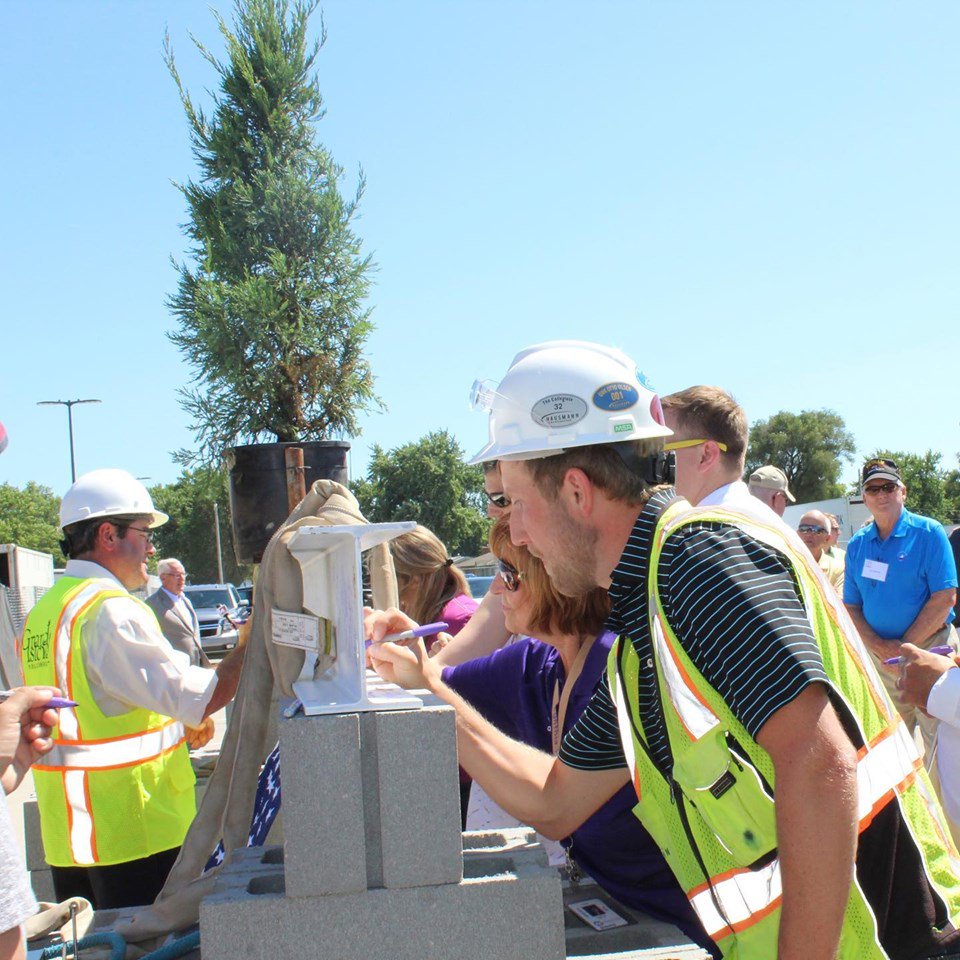 BuildHCI's tweet photo. What a great turn out for the Grand Island Public Schools memorial stadium topping out ceremony. It was exciting to see the community come together and celebrate the future!
•
•
•
#buildHCI #hausmannconstruction #toppingoutceremony #finalbeam #construction #grandisland https://t.co/ygIufj2N1U
