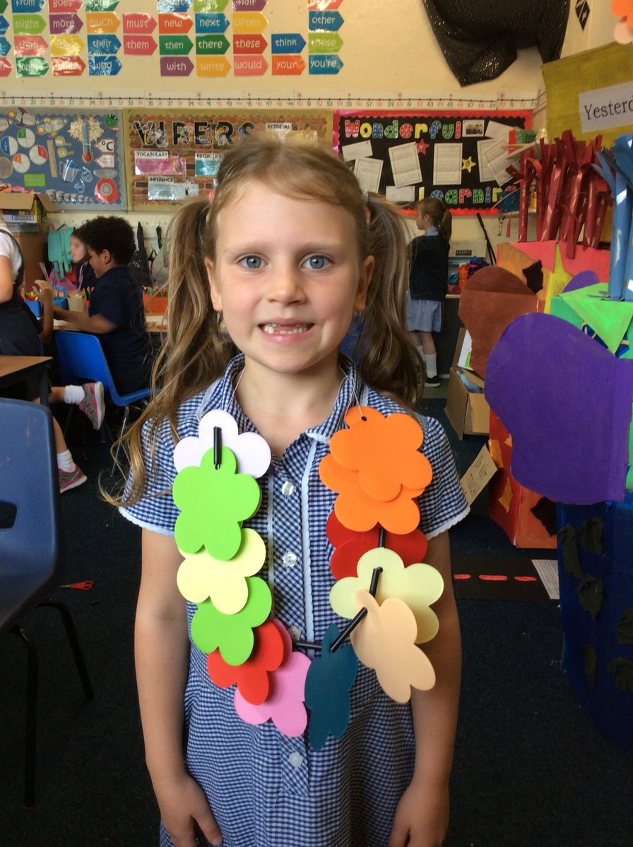 Modelling our flower garlands!!! Ready to sell them at the Festival on Saturday.