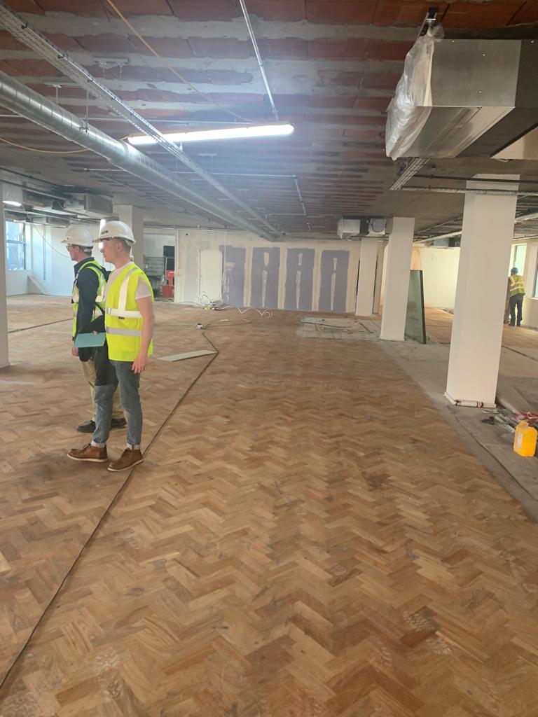 CERT_property's tweet photo. Hilton house is looking amazing! 
Sanding of floors bringing this fantastic wood parquet flooring back to its former glory! #flooring #hiltonhouse #Manchester #certproperty #property #development https://t.co/tsGYCgaRSI