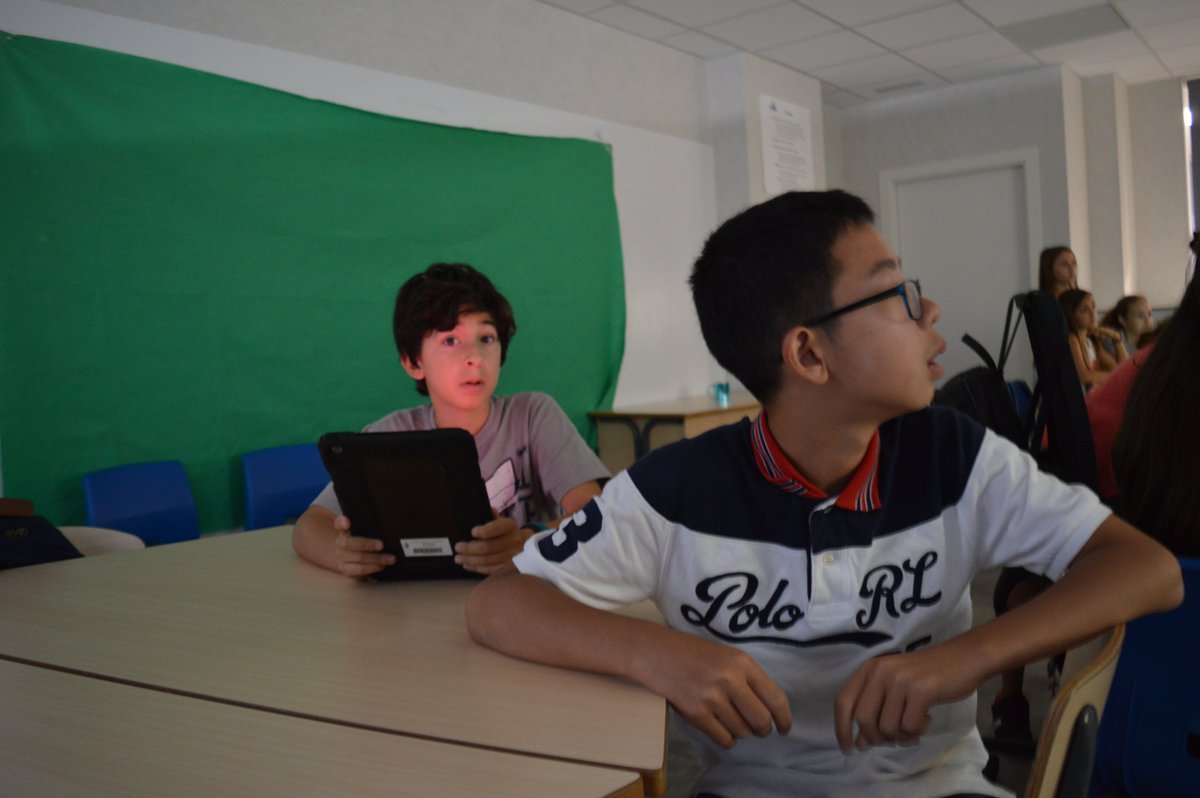 ASBEnglish's tweet photo. In their unit on "Food Around the World," Class B3 is learning about typical foods from different countries. Pictured below are students playing an online learning game, Kahoot, using the iPads to respond in teams. May the best team win! https://t.co/DwU1NBdoGL
