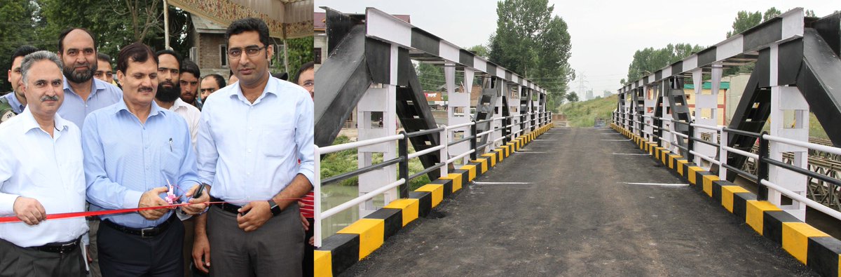 Commissioner Secy.Public Works Department Khurshid Ahmad Shah in presence of DC Srinagar <a href="/listenshahid/">Shahid Choudhary</a> Thursday inaugurated the newly built bridge over Doodganga channel at Bagh-e-Mehtab~30-meter-span truss bridge provides important link with airport road.
