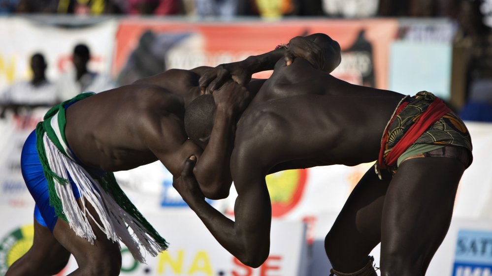 AJEnglish's tweet photo. How traditional wrestling outgrew its local roots to become a major national sport in Senegal https://t.co/GzAyedYpxy [via @AlJazeera_World] https://t.co/ugXXWMZgtV