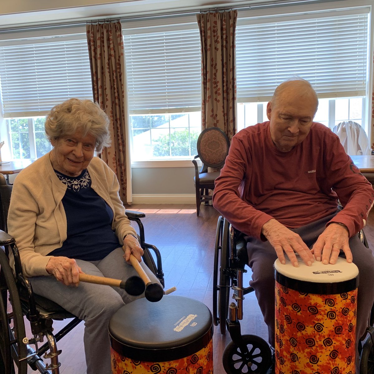 DrummingAround's tweet photo. While working in retirement communities, I don’t get to drum with married couples very often. I didn’t ask their ages, but Martha and Joe got married in 1952! They are full of joy and they both have a playful spirit. Inspiring!!! #drummingwithseniors @meinlvivarhythm https://t.co/zjcogeN01r