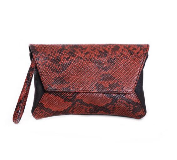 We are excited to launch the JAN clutch bag. Designed by the House of Cinnamon woman for the House of Cinnamon woman. #limitededition #July #keypieces