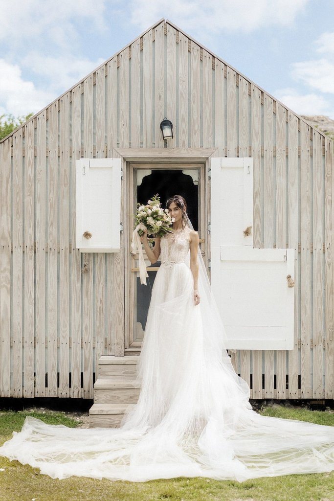 @DanielleaSnyder, cofounder and designer of the fashion and accessories brand, @Dannijo, wore a custom #ReemAcraWedding gown to her ethereal beach wedding on Harbour Island. 

Photographer: @sergiosandonaphotos 

#ReemAcra #Bridal #Bride #wedding #weddingdress