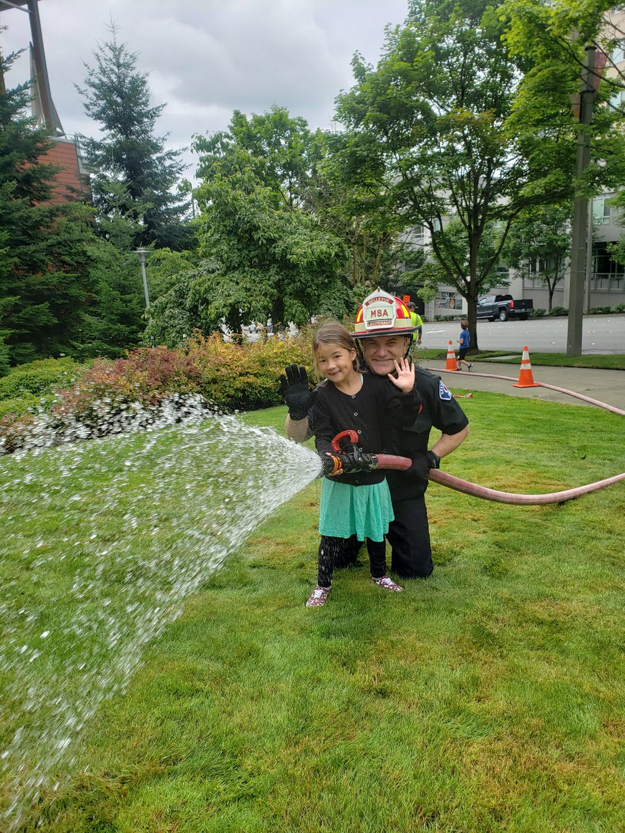 Kids getting a chance to spray water from a hoseline as part of @bellevuewa #TakeOurChildrenToWorkDay. The kids get to shadow their parents and see what other city departments do.