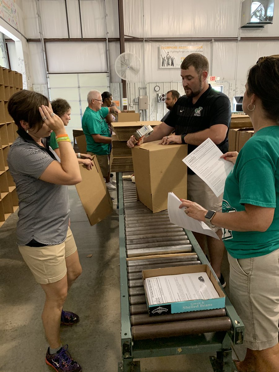 MEADECOUNTYHIGH's tweet photo. MCHS Admin serving @FeedingAmerica today.  Great day of service and bonding! https://t.co/LkeEeZ4q4F