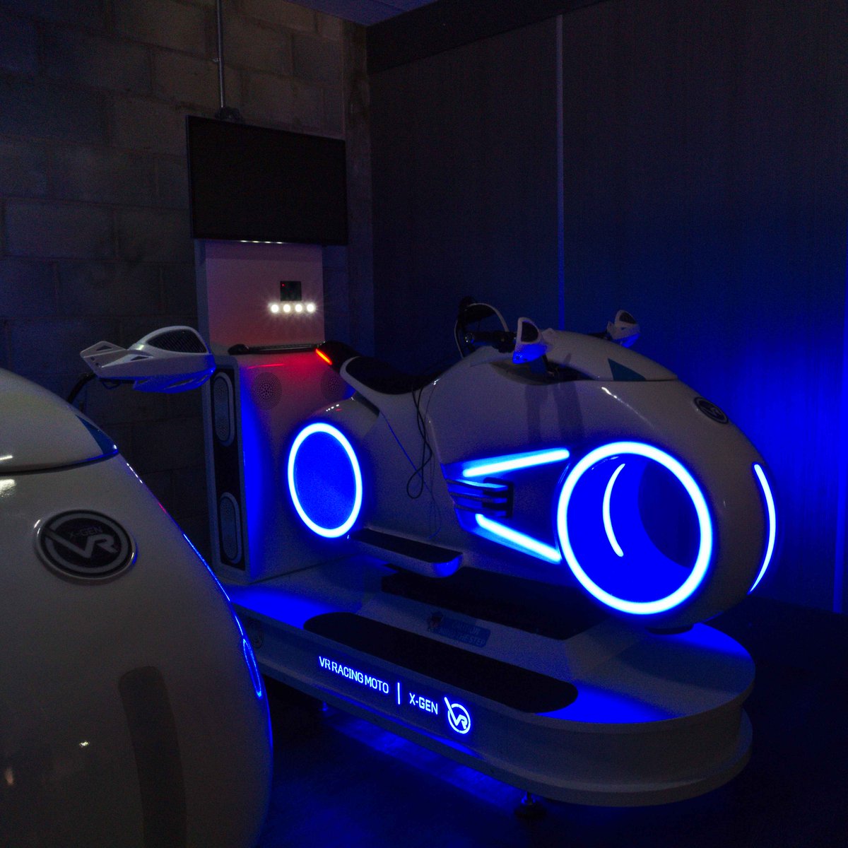 Remember Tron? We do! Ride your own lightcycle today at X-GENVR and experience high-speed virtual racing like never before! #stockport #manchester #virtualreality #mcr #cheshire #thingstodo
