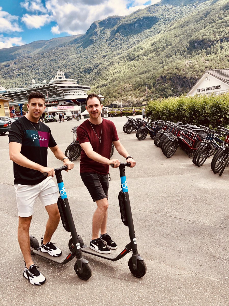 TwistandPulse's tweet photo. Stop No.3️⃣ #Flaam @pandocruises ⛰ We rode around on these bad boy scooters 🛴 Then managed to hike up the mountain the see the lovely #Brekkefossen Waterfall! Loving this cruise so far. We promise we are working. Sometimes😉🙌🏼 #NorwegianFjords https://t.co/ivgc0rbFhy