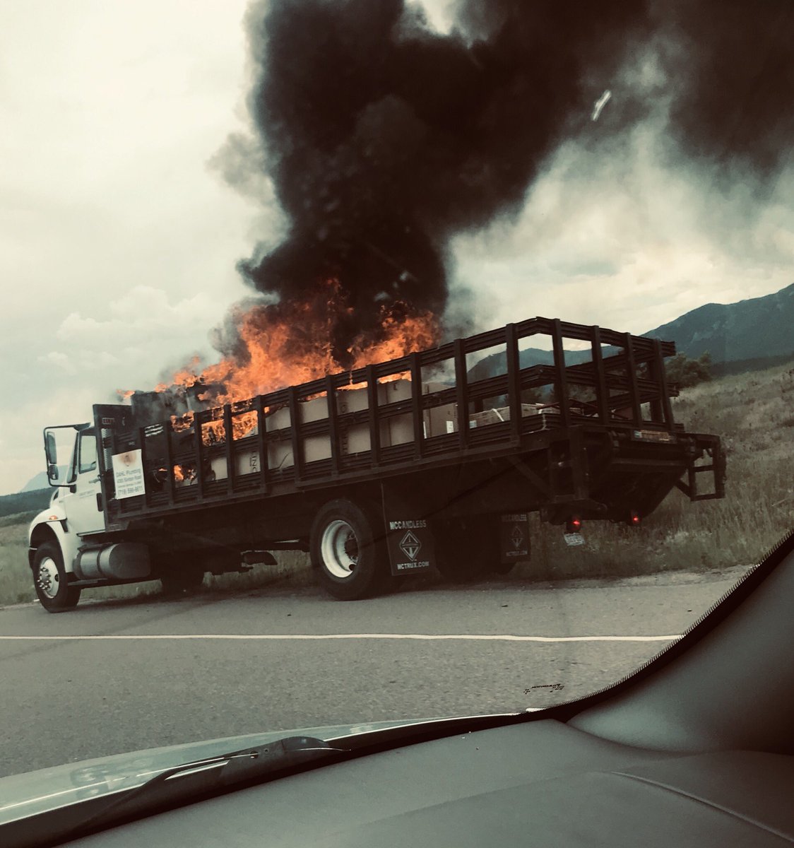 iamYANYEZ's tweet photo. Is it weird that this is the 4th time in my life I’ve seen a vehicle consumed in flames on the side of the road? What’s worse - I still don’t know what to hashtag for something like this? #WeakTwitterGame #IDFK https://t.co/BEwUYqPm45