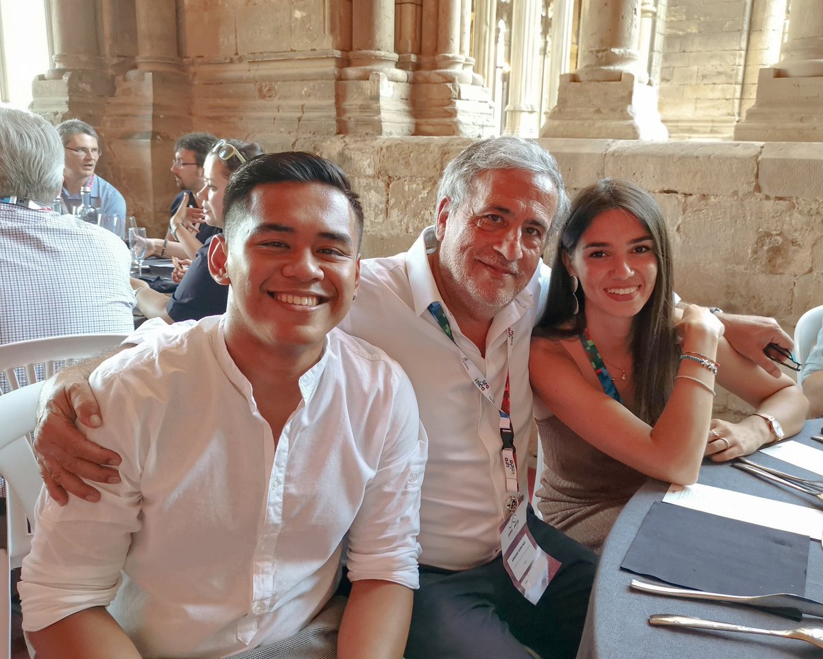 Morena80002148's tweet photo. On the top of @TuroSeuVella, inside the old cathedral of #lleida, we had a great Gala Dinner organized by @isag2019. 
Here with my supervisor @Armandsbonastre and my colleague Yron Manaig, from #UAB. https://t.co/IKKOGacQeq