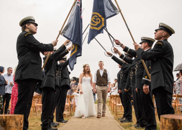 What a wonderful way to end the week seeing this Guard of Honour for Coastguard couple Marcus 🤵 and Amelia Taylor-Mills 👰 who have just got married 💒 after meeting at #Bacton Coastguard Rescue Station in 2016! #FridayFeeling  ow.ly/q3KM50uZrwP