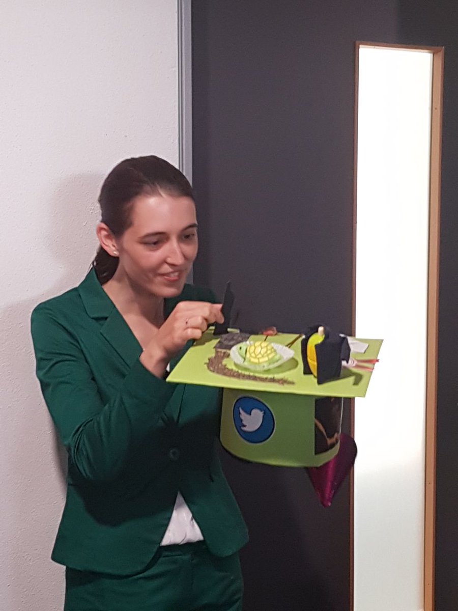 ... and she successfully defended and got her beautiful and obviously green hat. 🎉🙌👨‍🎓