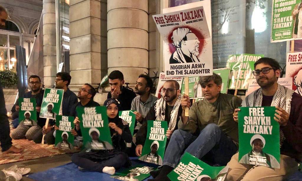 PressTV's tweet photo. Protesters gather outside #Nigeria’s Embassy in #London to demand the immediate release and access to treatment for Sheikh #Zakzaky.

#IslamicMovement #FreeZakzaky @ihrc #FreeZakzakyForTreatment https://t.co/NznJXvZrP9