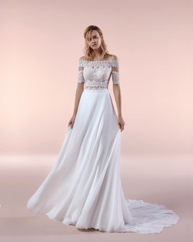 Feminine and romantic with this gorgeous bodice made of bohemian lace 💐
.
.
[Dress: BCA20091 online on nicolemilano.it] #Nicole2020Collections #BohoChic ift.tt/2YR200O