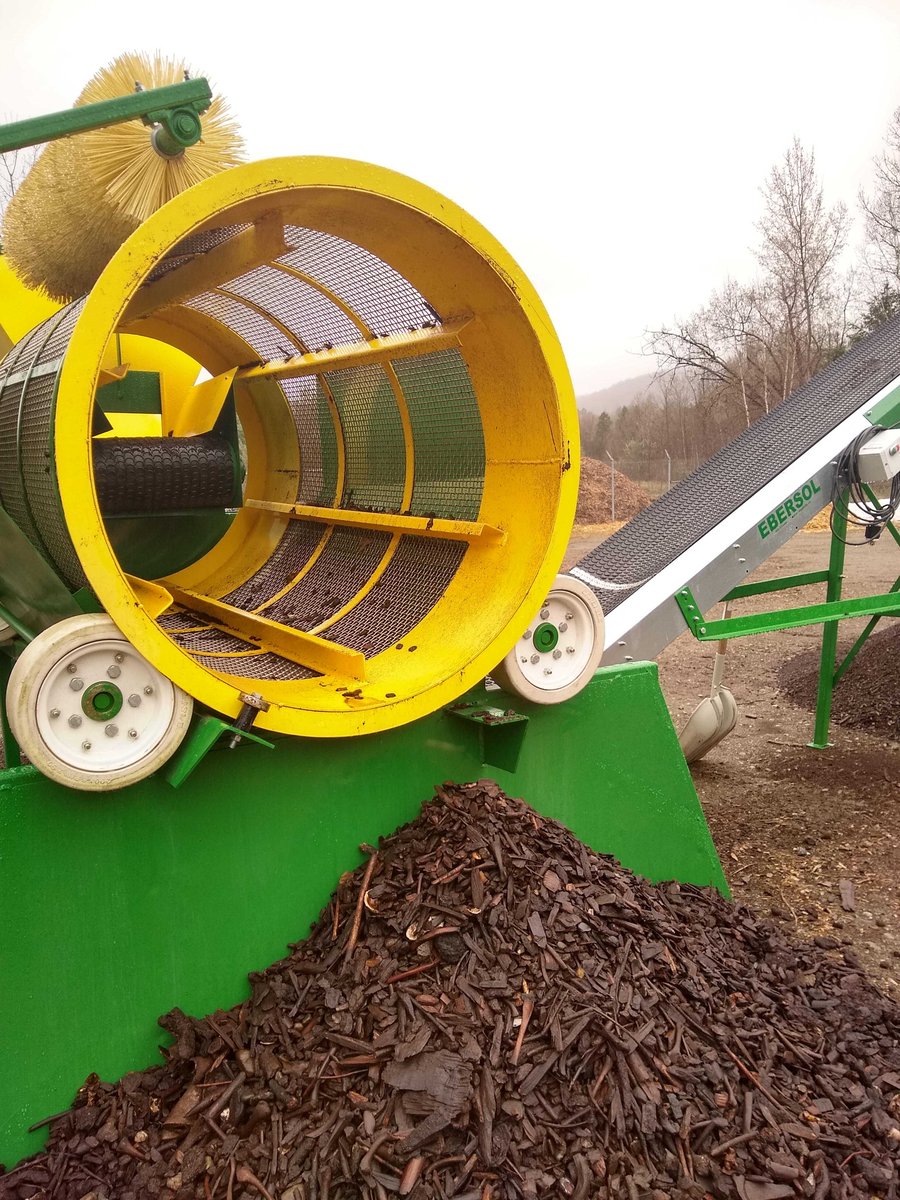 Check out our screener in action! The woody, chunky debris in our compost pile get screened out with this machine into our “overs” pile. These overs then get used again in our compost pile recipe; the microbes sure do like the diversity of material in the pile! #compostiscool