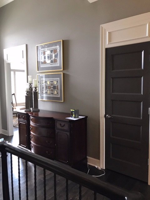 Dark doors have become a new trend and we're loving them!  #interiordesigntrends #trends #interiordesign #darkdoors #kansascityinteriordesign #interiordesign #kcinteriordesign #kcdesigner #interiorhome #interiordecor #kansascitydesign #kcinteriors