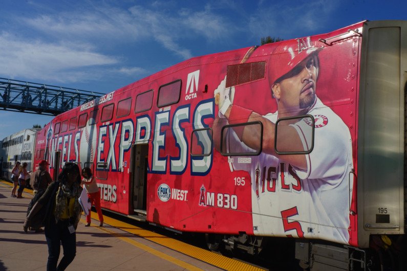 OCTAnews's tweet photo. Going to see the @Angels as they return at the All Star break tonight in #Anaheim ? Consider taking #AngelsExpress @MetrolinkOC fan train to the #BigA for just $7 round trip. In July and August, kids 18 and under ride free! Info: https://t.co/de92fjLeFd https://t.co/co8ZGJIMmk
