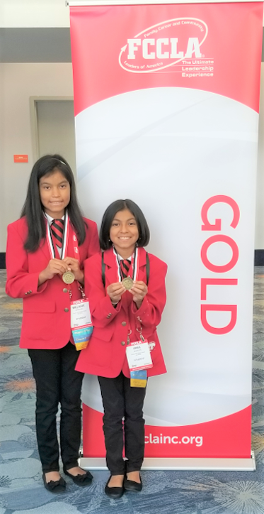 FultonCoSchools's tweet image. Tri-Cities HS rising 9th grader Melanie Morales and Paul D. West MS 7th grader Irma Morales scored 94.33 out of 100 to win Gold again at the FCCLA National Conference in Anaheim, CA. @DrNHenderson @PaulDWestMiddle @TricitiesFCS