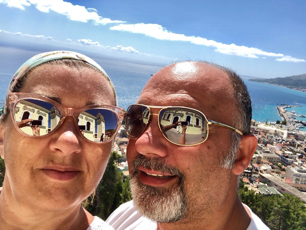 DimakisCathy's tweet photo. Hiked 2 kms to see this incredible view of Zakynthos port...and the pretty yellow church in our glasses 😎 https://t.co/QNxui5Vxww