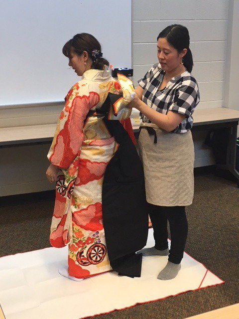 A2GlobalEd's tweet photo. #Hikone and #AnnArbor are celebrating 50 years as Sister Cities.  As a result, #AAPS students are learning about Japanese food and culture. Last night we hosted an amazing kimono demonstration followed by a sushi and takoyaki making class. @MayorTaylorA2 @A2schools https://t.co/7t1BNgl8SM