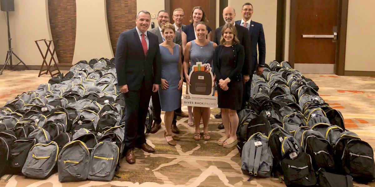 A group of people helped fill hundreds of backpacks for students at local schools