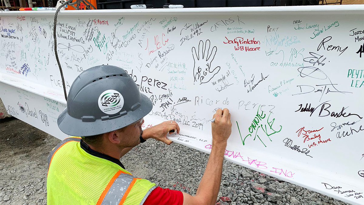 WBMGroupPLLC's tweet photo. Congratulations to the Ally Charlotte Center team for reaching a great milestone in construction with the topping out of the building.  We were proud to be on site for the event! https://t.co/e1g4dPWGWr