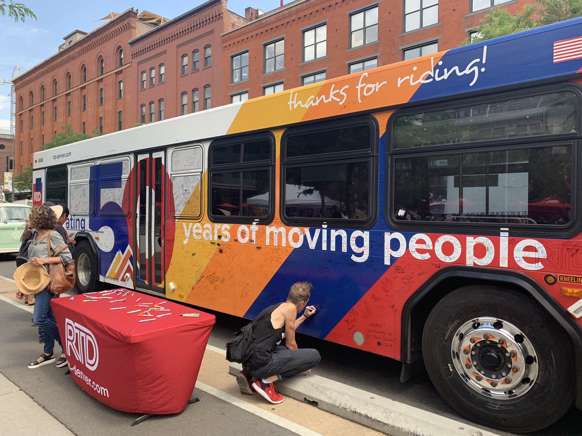 PLongoTonilas's tweet photo. People signing RTD’s 50th Anniversary bus! Groovy, Baby! #rtdis50 @RideRTD https://t.co/i0551lAgXa