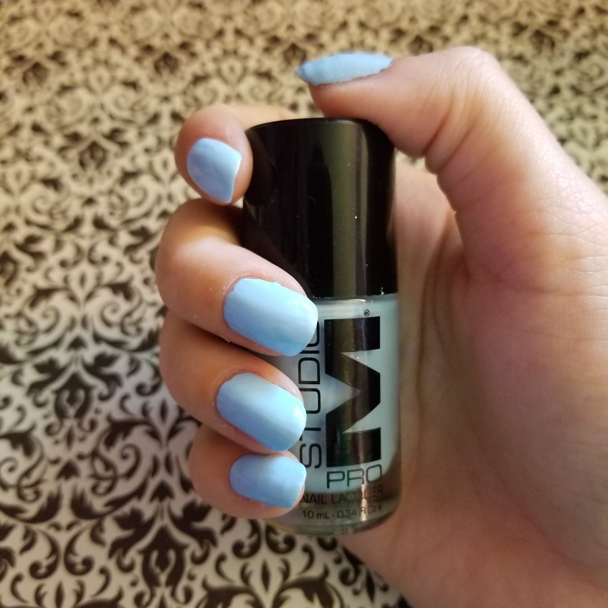 My favorite light blue polish Studio M's "Who's That Girl"