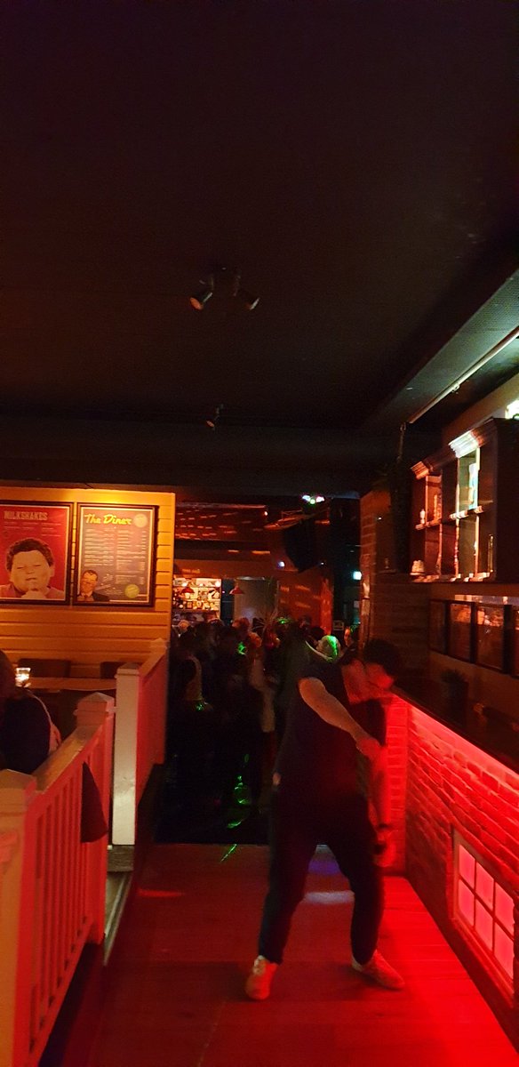 Thormatt's tweet photo. Mid-July in one of the most popular bars in Iceland. Apart from my friend dancing in the middle, the hallway should be packed at 2 am https://t.co/v2xk7QnDAY